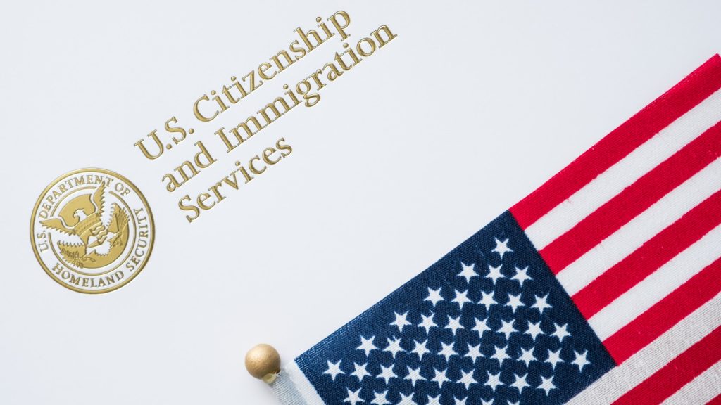 USCIS logo and American flag