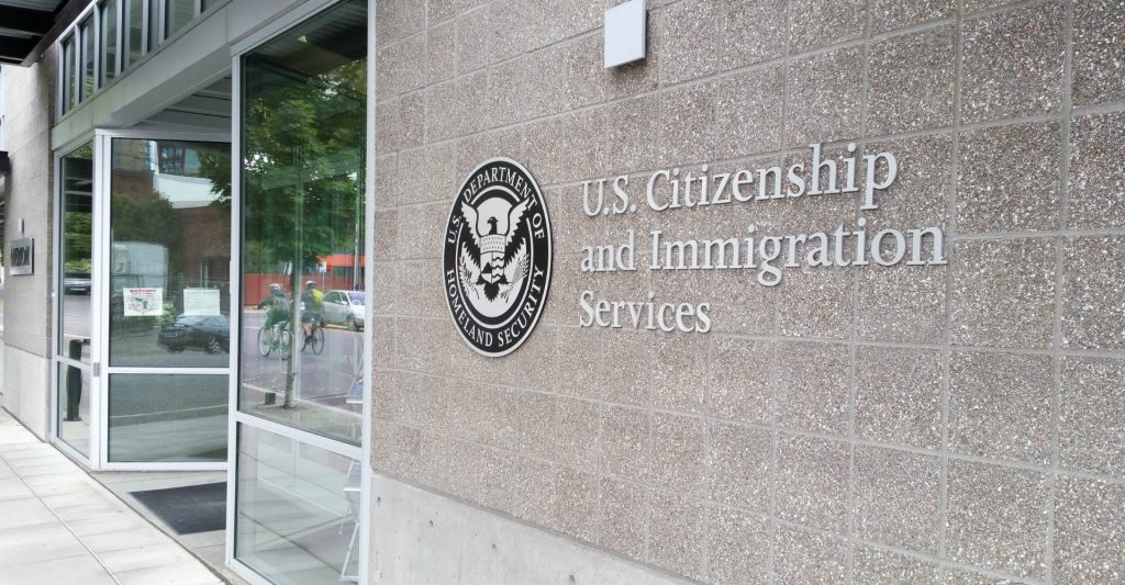 USCIS logo on building