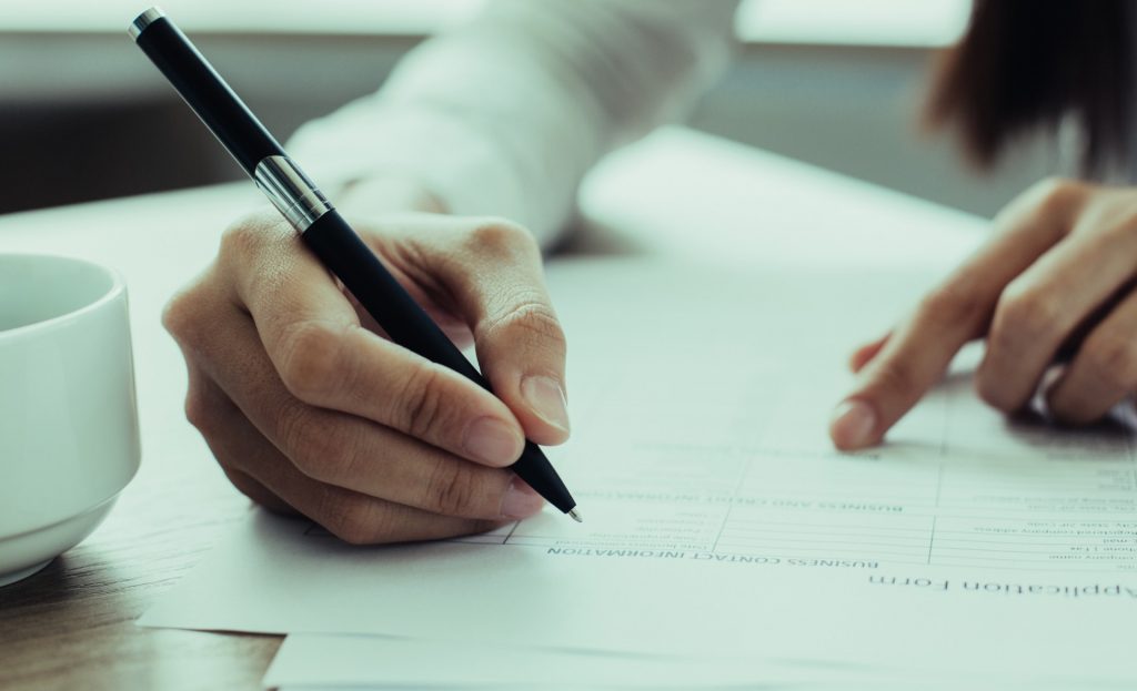 Person completing paperwork