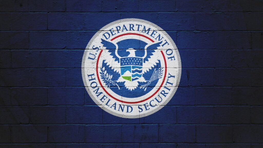 The DHS logo on a blue background.