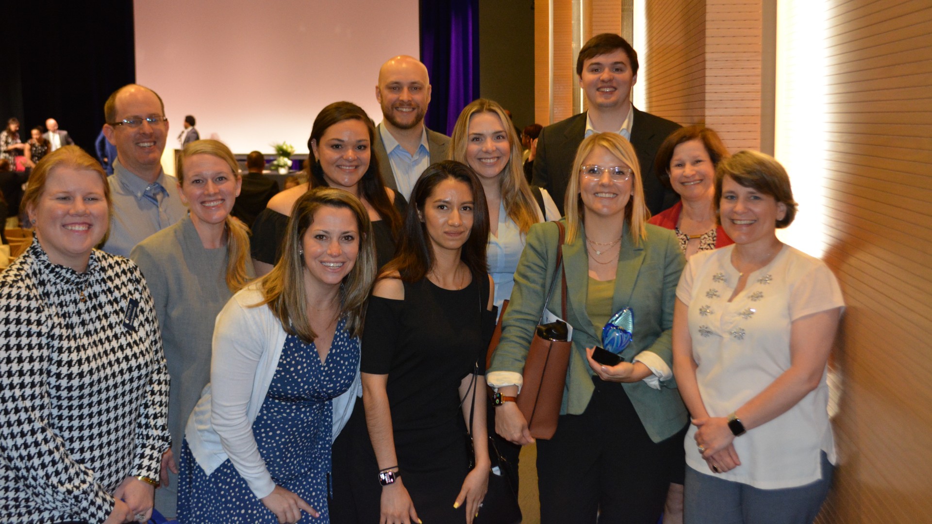 Staff members of Garfinkel Immigration Law Firm and Legal Aid of North Carolina pose for a picture.