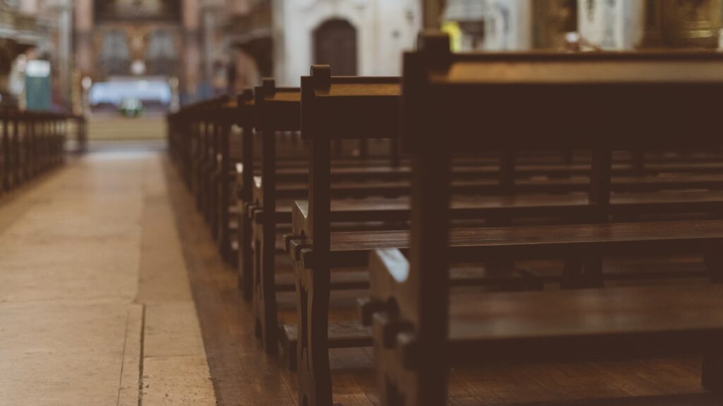 Pews in an empty House of Worship.